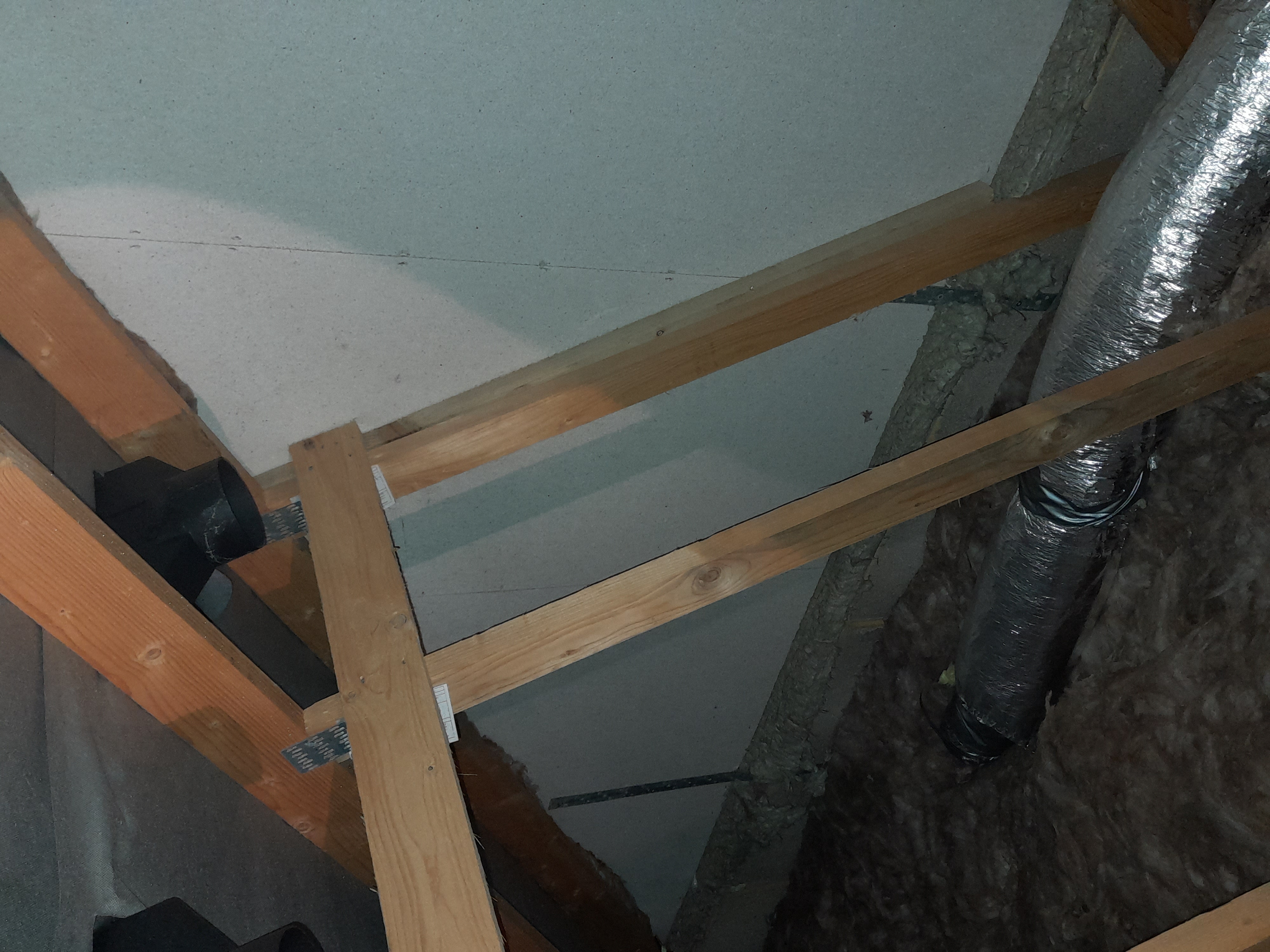 Fig. 6: En-suite extract ductwork not connected to roof terminal. This is careless at best and lazy at worst. 